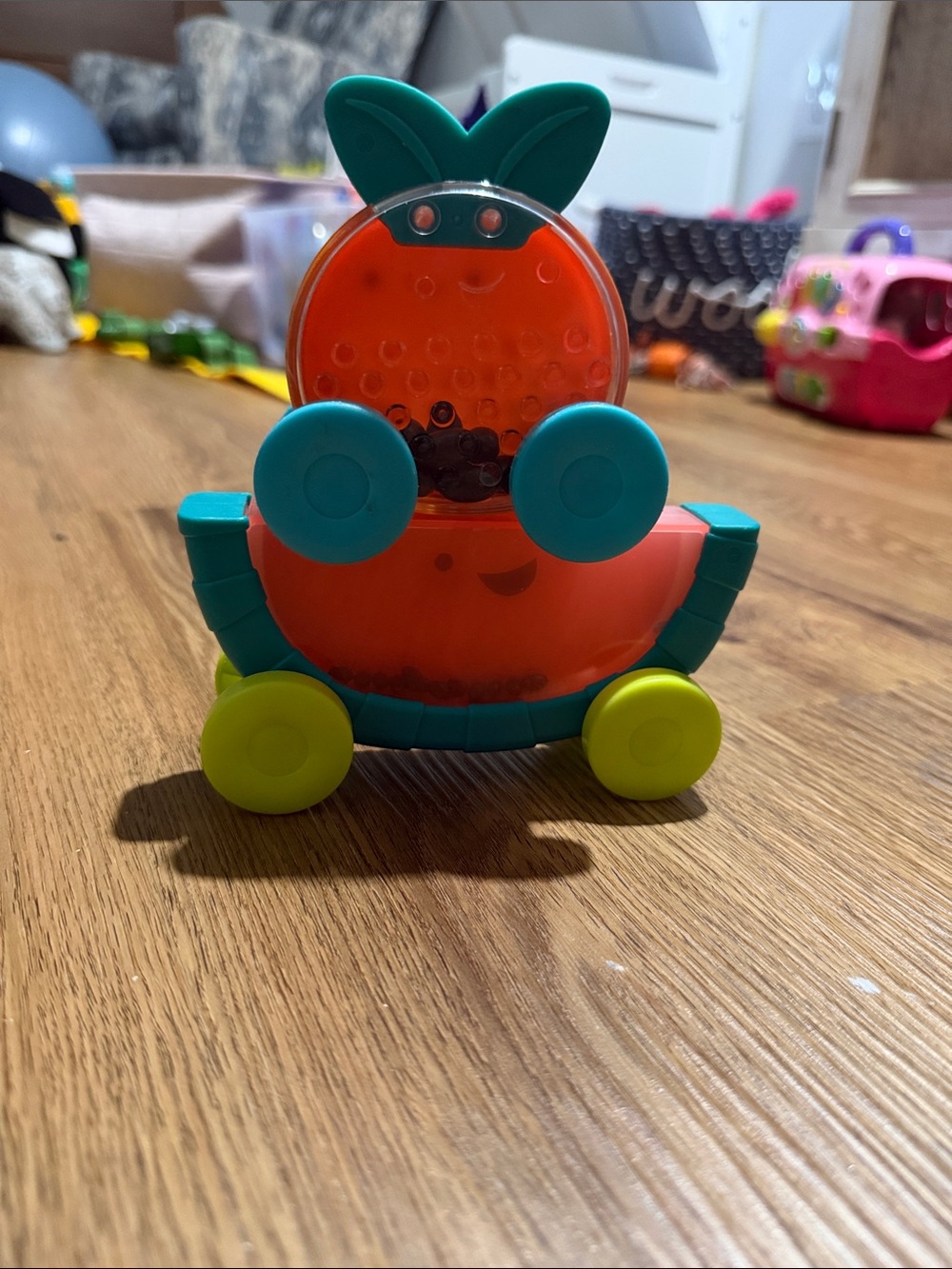 Kids Orange Teether Rattle Toy with Green Accents